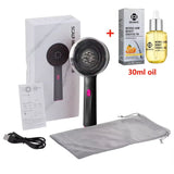 Black electric scalp massage comb with red-light LEDs, USB cable, storage pouch, user guide, and 30ml hair density essential oil.