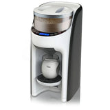 Automatic baby formula maker with powder hopper and bottle platform, white and black.