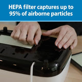 HEPA filter being installed into base of sterilizer – captures 95% of airborne particles