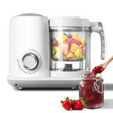 4-in-1 baby food maker in white with blending jar full of fruit next to a jar of strawberry puree.
