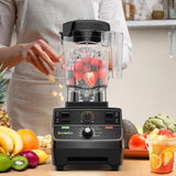 BioloMix blender on kitchen counter while ingredients are added for a smoothie