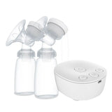 White double electric breast pump set with bottles and control base, angled view