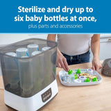 Baby bottle sterilizer loaded with 6 bottles and accessories – easy to organize and sterilize