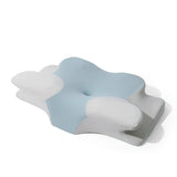 Light blue and white shaped pillow with deep center cutout for neck alignment and spine comfort