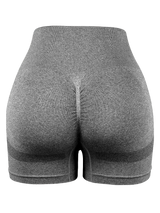 gray seamless high-waist butt-lifting shorts with compression fit and stretchy material for yoga and training.