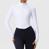 Model wearing white Hearuisavy yoga jacket with long sleeves and thumbholes