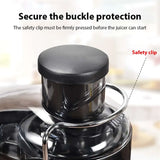 Close up of safety locking clip and feed chute cap on the juicer lid