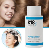 K18 Peptide Prep pH maintenance shampoo with model showing silky glossy hair
