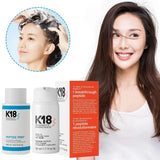 Woman smiling after using K18 Peptide Prep shampoo and leave-in molecular repair hair mask