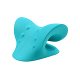Blue cervical traction pillow used for neck support and chiropractic alignment therapy