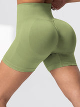 olive green seamless high-waist butt-lifting cycling shorts for women, ideal for yoga, gym, and activewear.