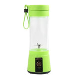 Green portable smoothie blender front view showing six-blade assembly and power button