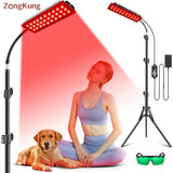 Woman and dog enjoying red light therapy under dual-panel infrared lamp with stand for wellness and relaxation