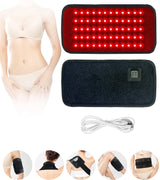 Woman using red light therapy belt on abdomen for slimming and skin tightening