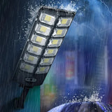 W789 Solar Wall Light in rain – Waterproof LED panel in outdoor storm conditions
