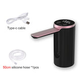 Black and rose gold USB water dispenser with LCD display, 50cm food-grade silicone hose, and Type-C charger cable