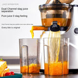 Close-up showing dual outlets separating clear juice and pulp.