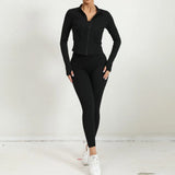 Front view of black women’s 2-piece yoga outfit with zip jacket and high-waist leggings.