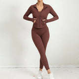 Front pose showing brown yoga outfit with zip jacket and matching high-waist leggings.
Image 6