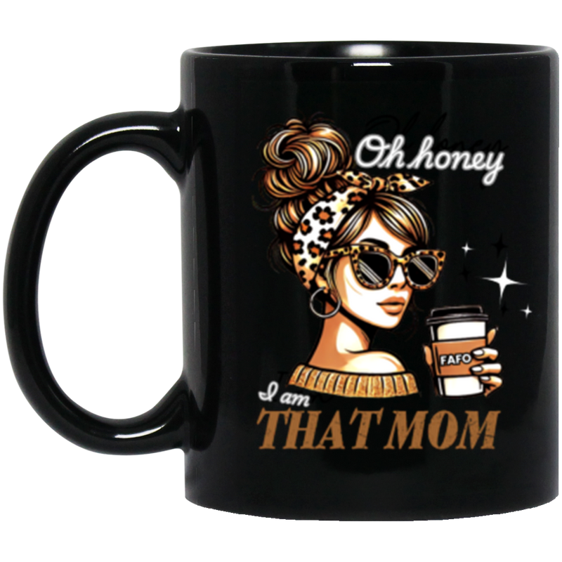 Black mug with a graphic of a woman holding a coffee cup and text 'Oh honey I am THAT MOM' on a white background.