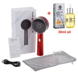 Red handheld scalp massager and boxed kit displayed with accessories and 30ml essential oil, suitable for applying oils while massaging.