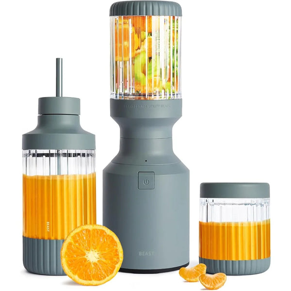 Beast Mini Blender Plus kit in Mist: 600W base, 640 mL cup, straw bottle and 415 mL cup with orange juice and fruit
