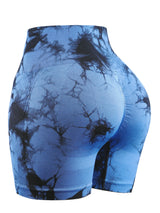 blue tie-dye seamless high-waist yoga shorts for women with scrunch butt design and moisture-wicking fabric.