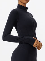 Side view of black Hearuisavy yoga jacket highlighting soft stretch fabric and fit