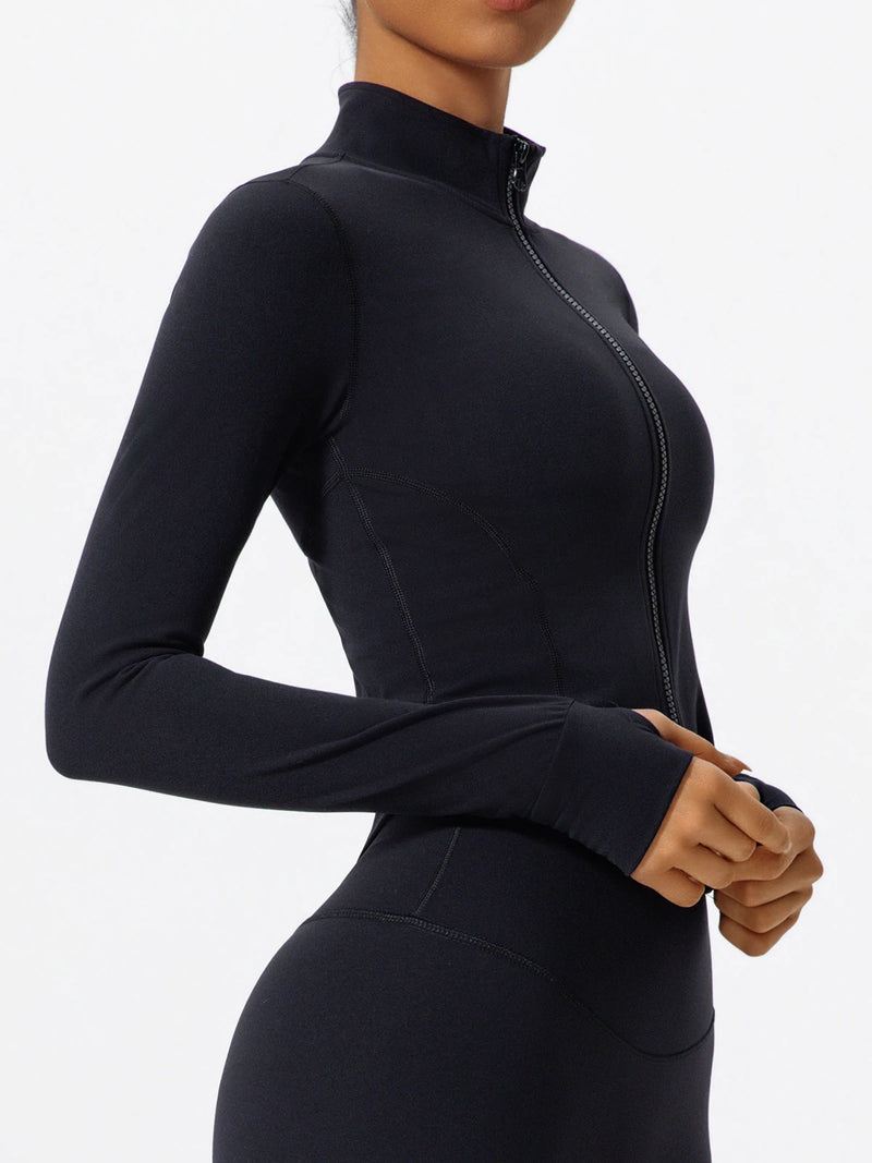Side view of black Hearuisavy yoga jacket highlighting soft stretch fabric and fit