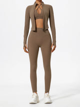 Brown Hearuisavy yoga jacket worn open over matching sports bra and leggings