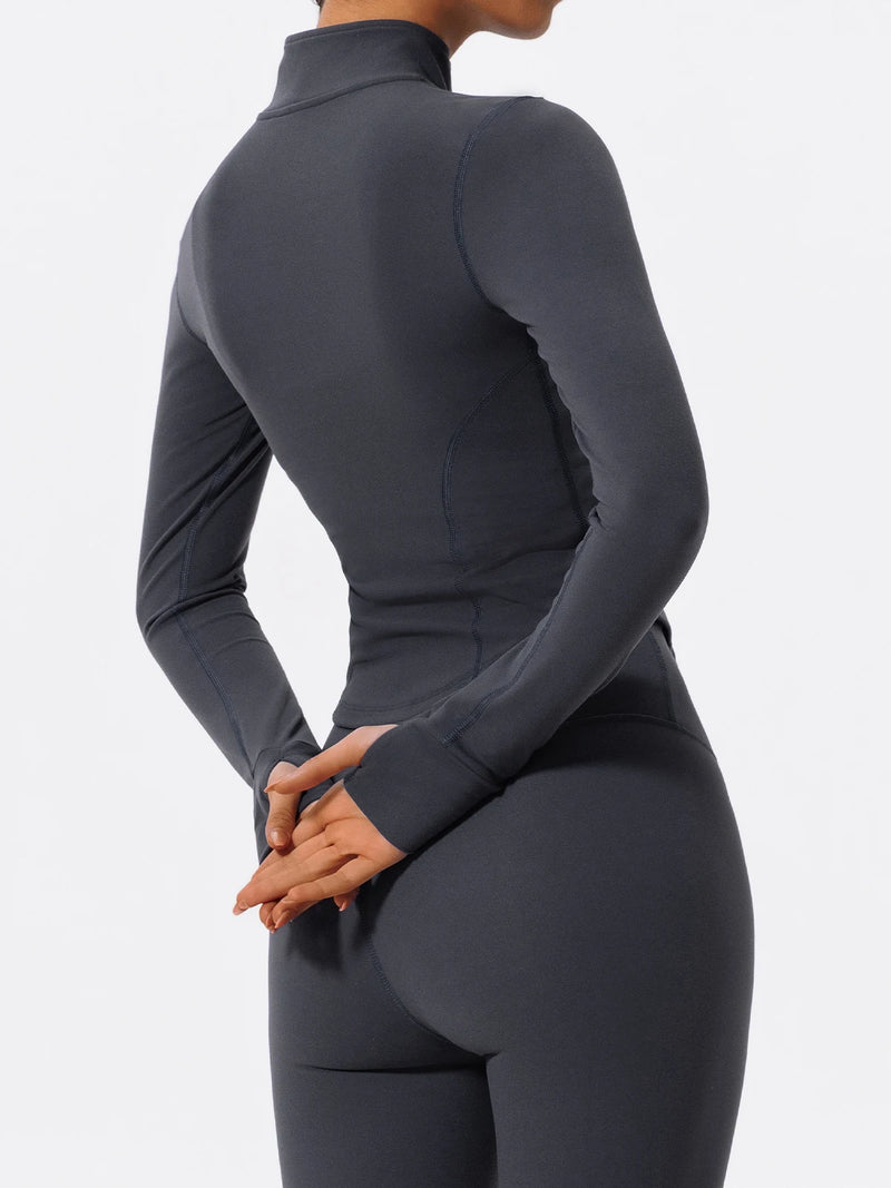 Side view of dark blue Hearuisavy yoga jacket showing long sleeves and thumbholes