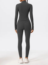 Back view of gray Hearuisavy yoga jacket highlighting sculpted seams and long sleeves