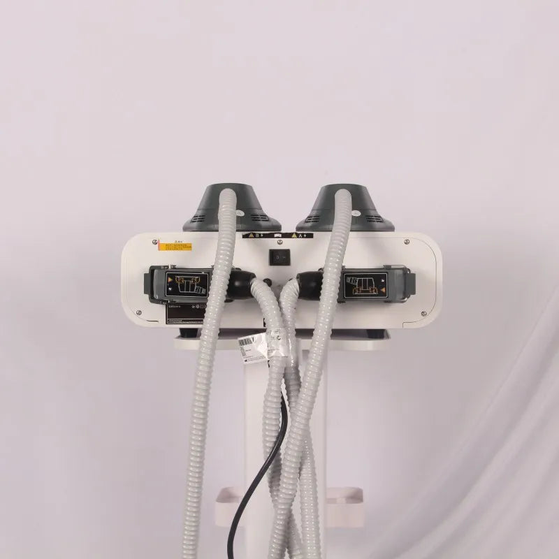 Rear view showing connectors, power switch, and flexible hoses docks