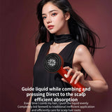 Model holding electric scalp massager with round LED head and silicone bristles for scalp care