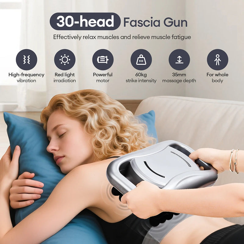 Using the 30-head fascia gun on shoulders and back—high-frequency vibration plus red-light irradiation for deep relaxation.
