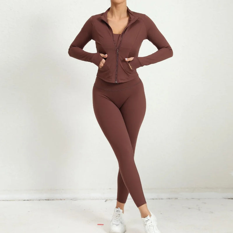 Front pose showing brown yoga outfit with zip jacket and matching high-waist leggings.

Image 6